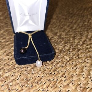 Elegant Gold and Black Pearl Necklace